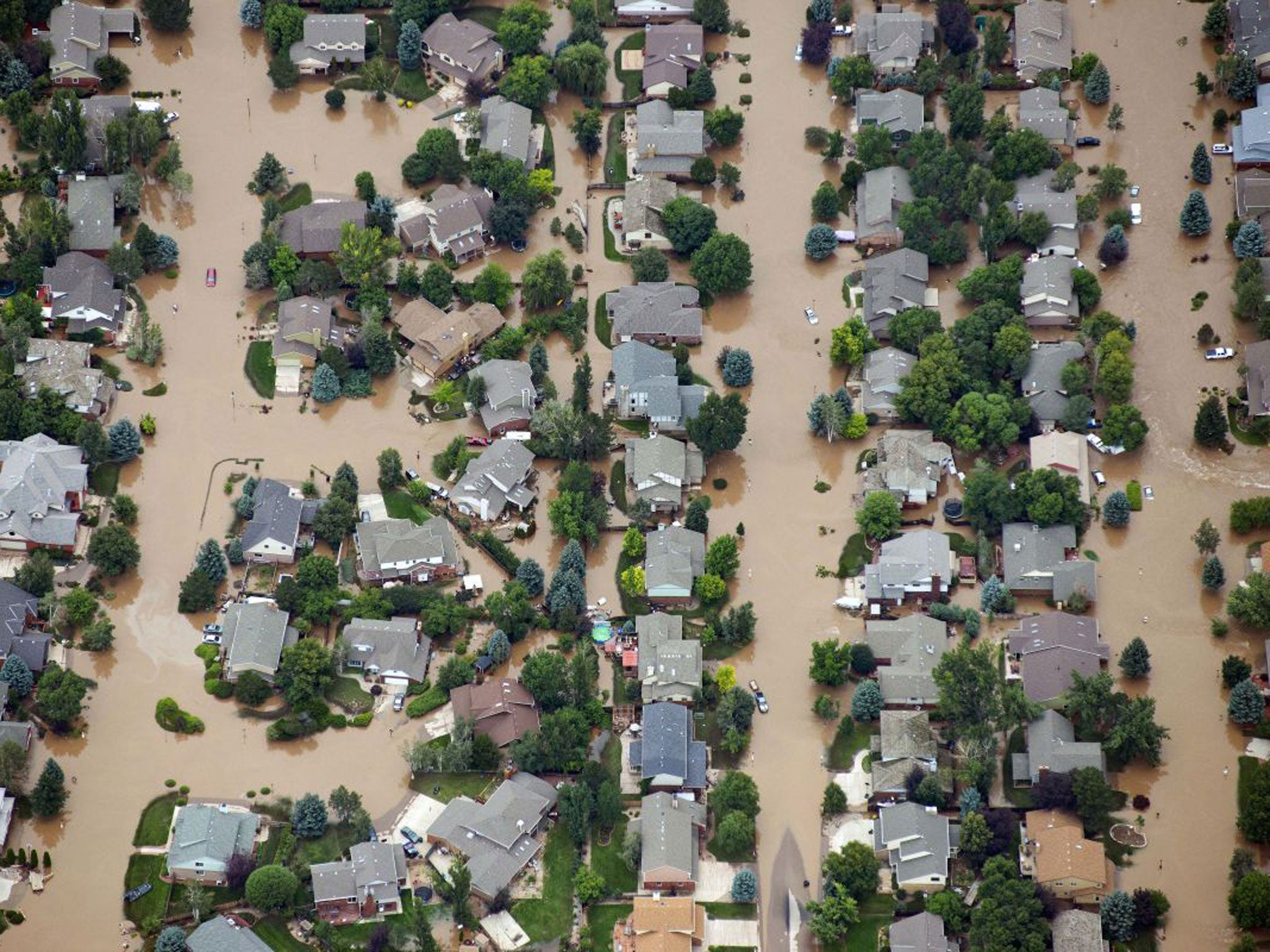 Homes in residential neighborhood in Longmont, Colorado, are submerged