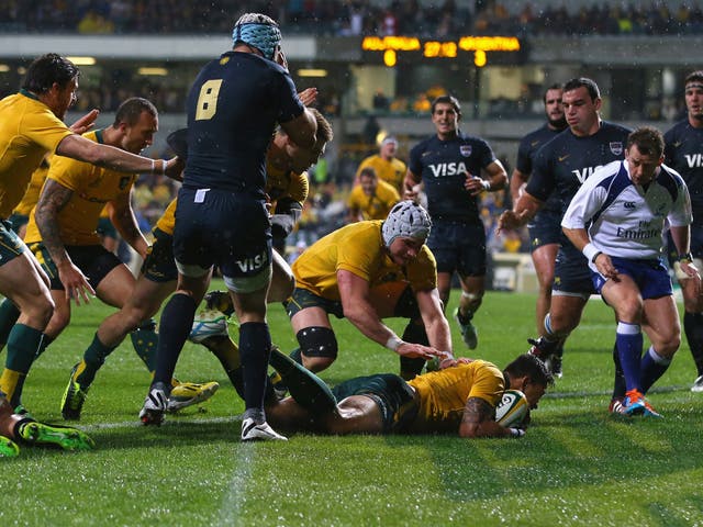 Israel Folau touches down for a try for Australia against Argentina