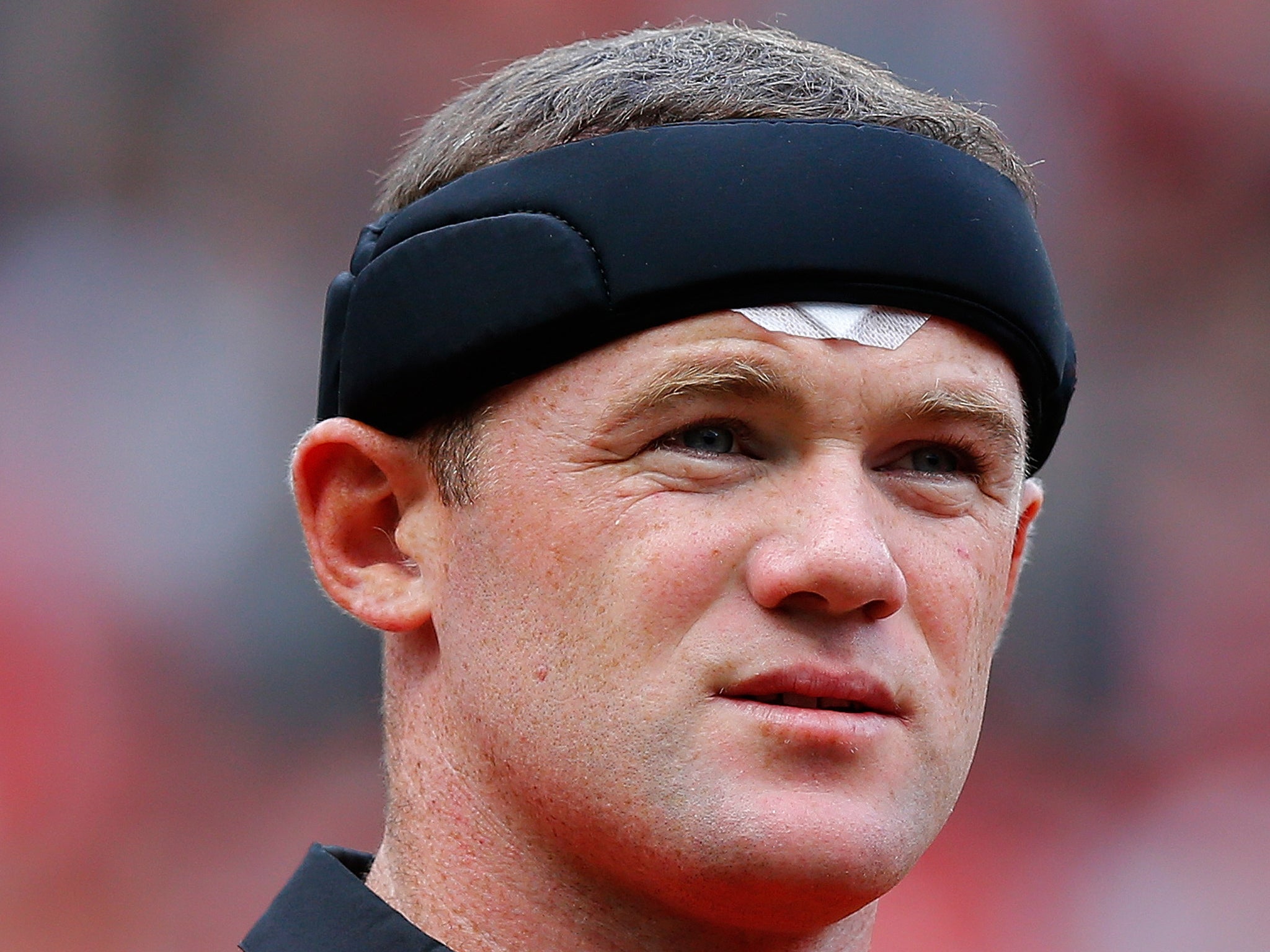 Rooney had his cut bandaged up and covered by a protective headband