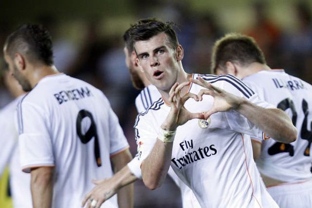 Gareth Bale celebrates his goal on his Real Madrid debut