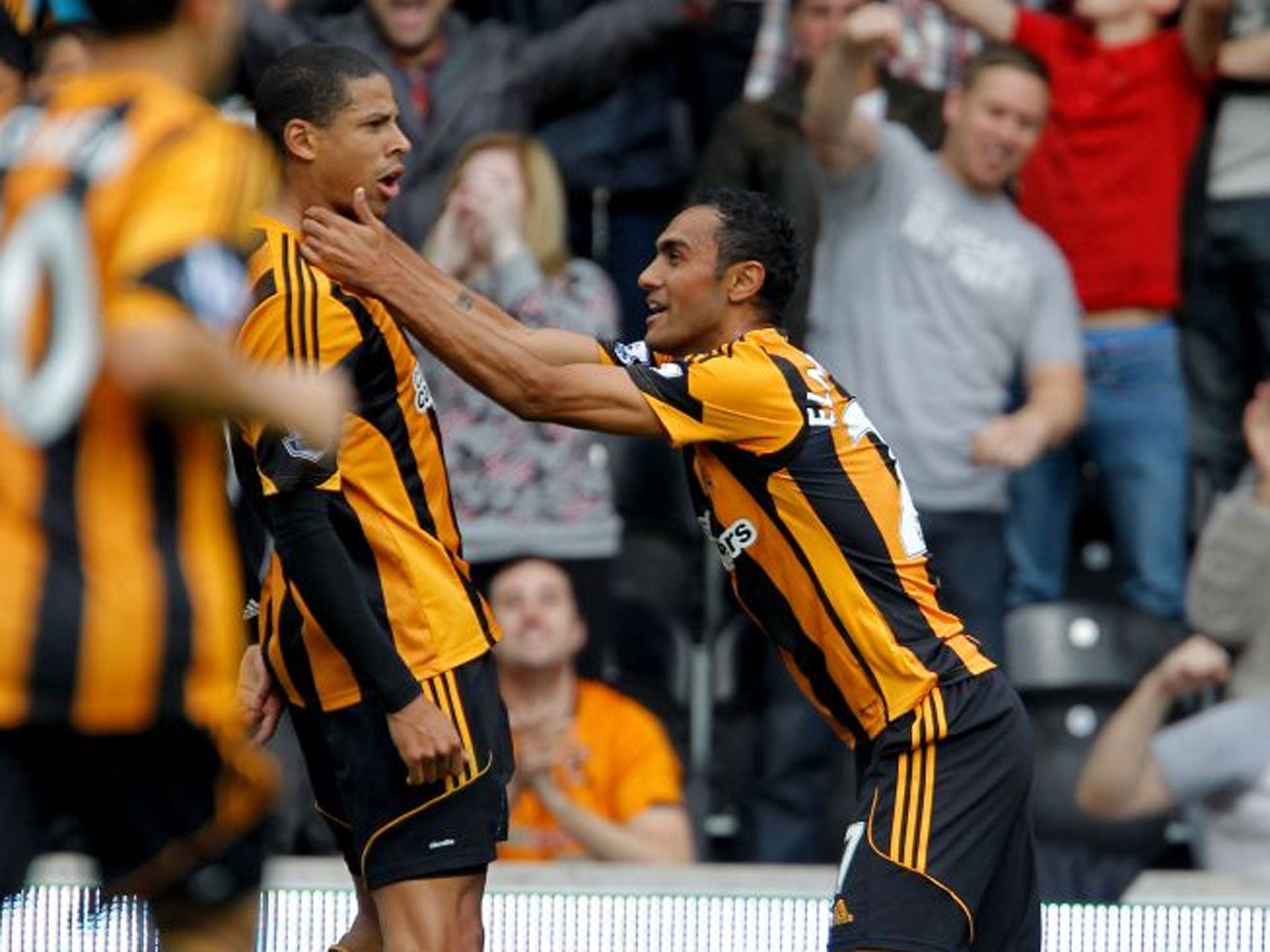 Curtis Davies and Ahmed Elmohamady celebrate for Hull