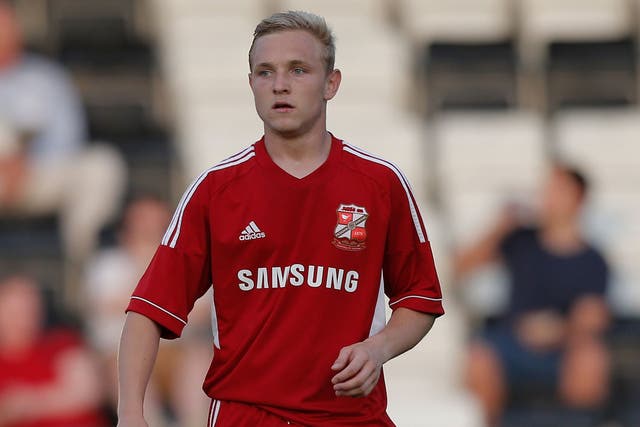 Going west: Alex Pritchard is one of three Tottenham prospects on loan at Swindon, who have also permanently signed three former Spurs players