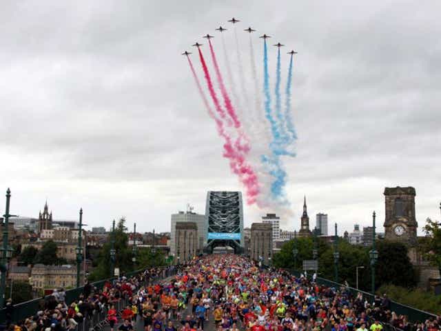Athletes crossing the Tyne Bridge as they compete in the 2013 BUPA Great North Run in Newcastle