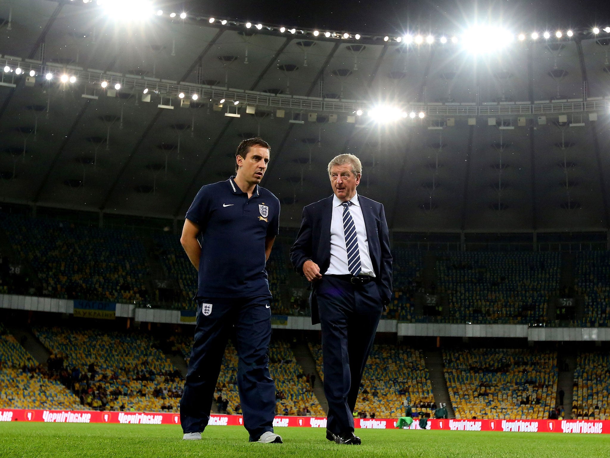 Roy Hodgson, right, and Gary Neville before the 0-0 draw in Kiev