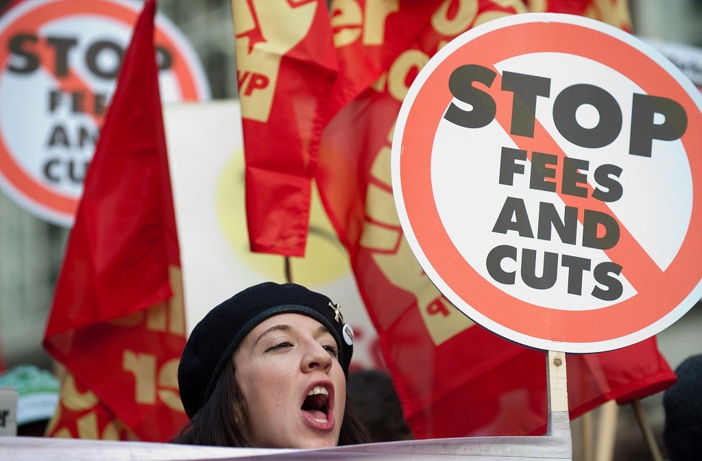 Students protest outside the University of London on 9 December 2010 against government proposals to let universities triple tuition fees