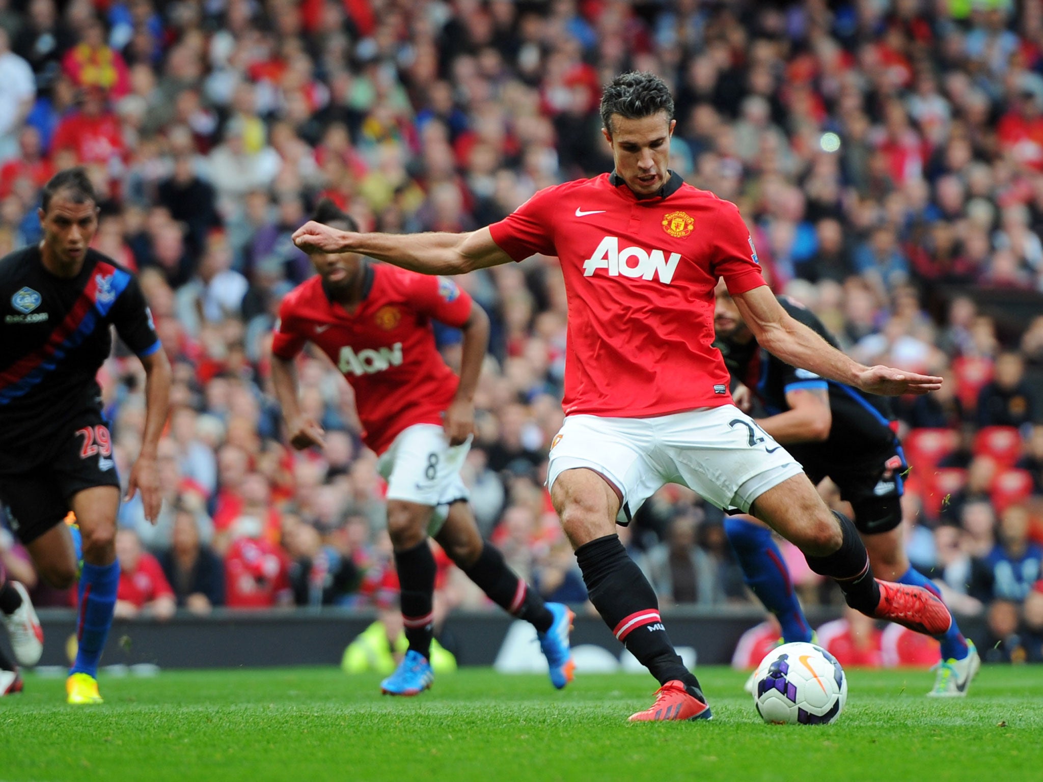 Robin van Persie scores from the penalty spot against Crystal Palace on Saturday