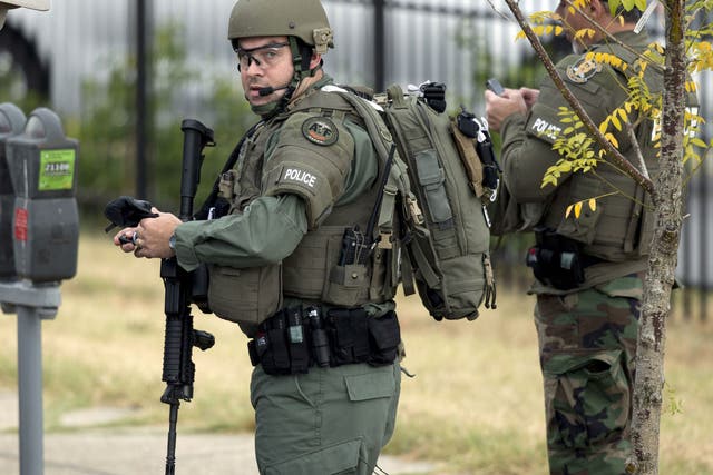 Armed police prepare to enter the Washington Navy Yard as they respond to a shooting in Washington