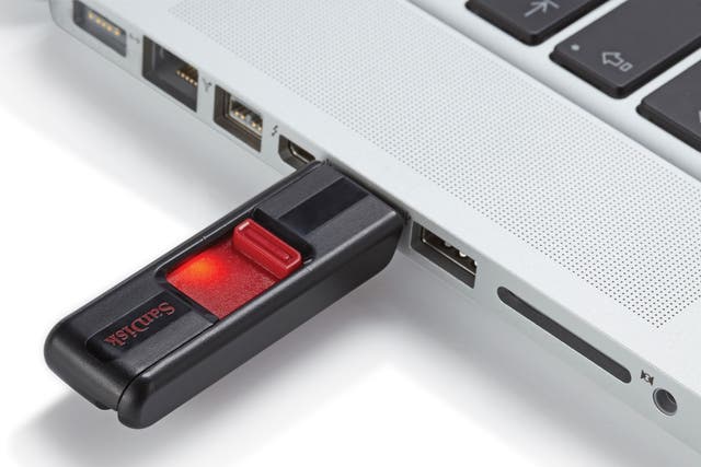 A USB stick shown plugged into a computer.