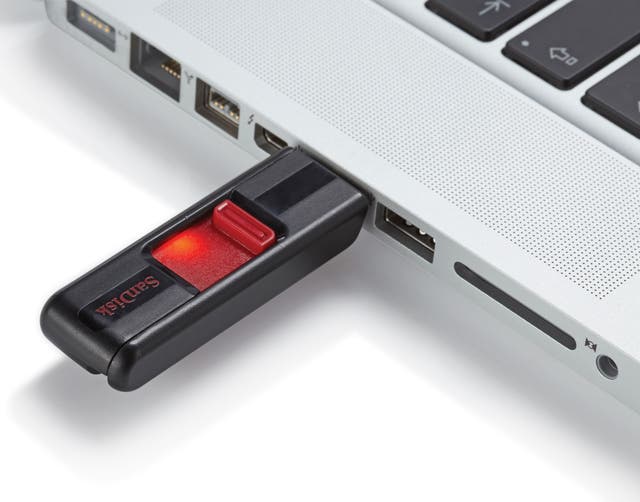A USB stick shown plugged into a computer.