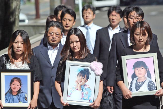 Family members of the children killed in the tsunami attend Sendai District Court