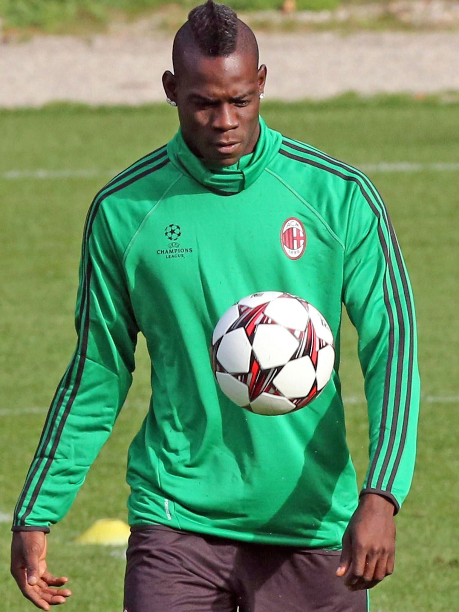 Mario Balotelli trains ahead of Milan's Champions League tie with Celtic