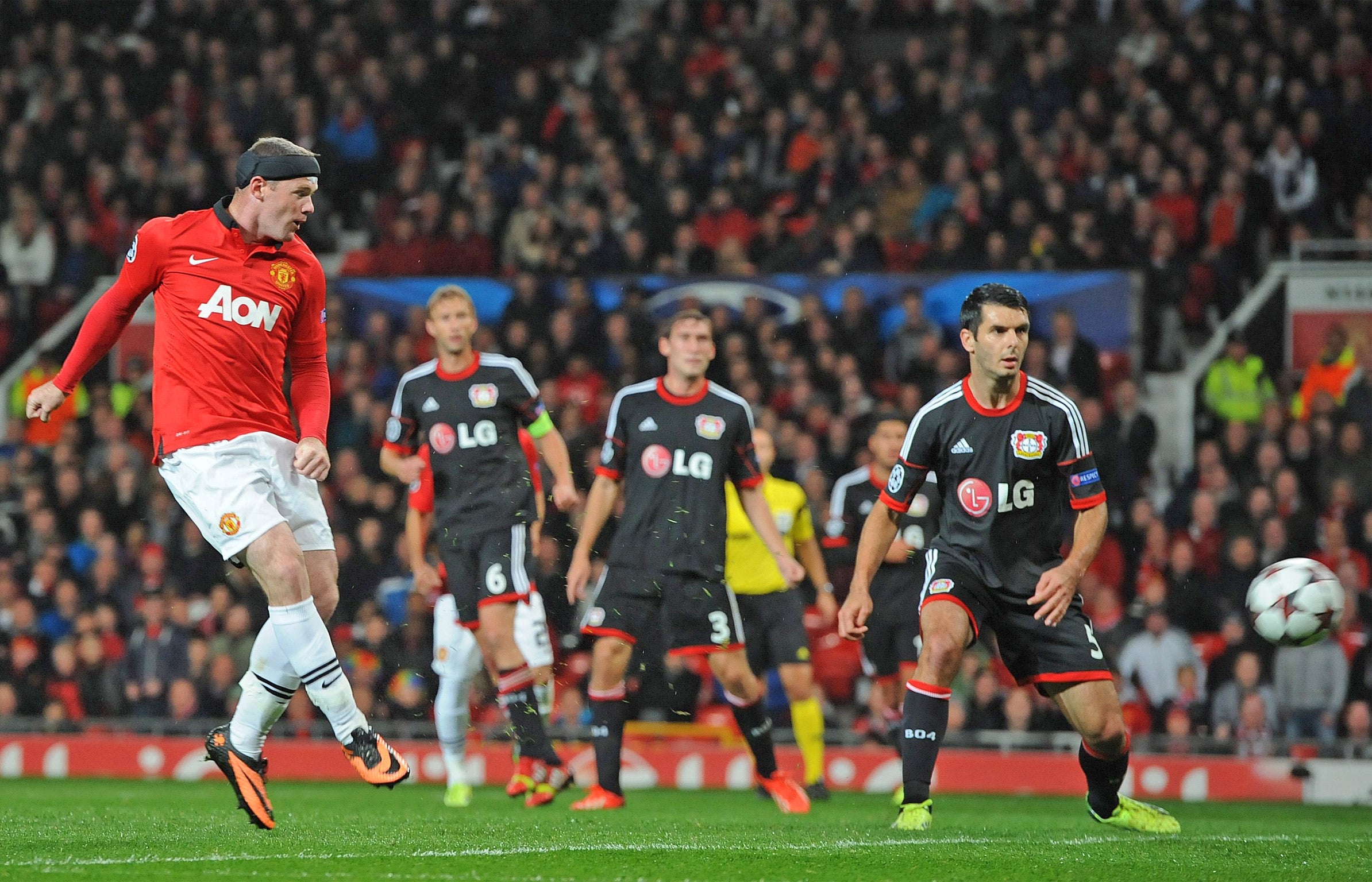 Wayne Rooney scores the opening goal