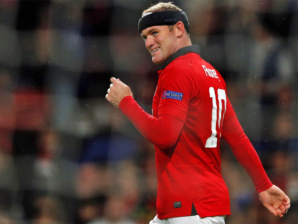 Wayne Rooney is delighted with his own form but wouldn't reveal if he is happy as a United player