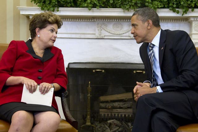 Dilma Rousseff and President Obama talking in the Oval Office in April 2012