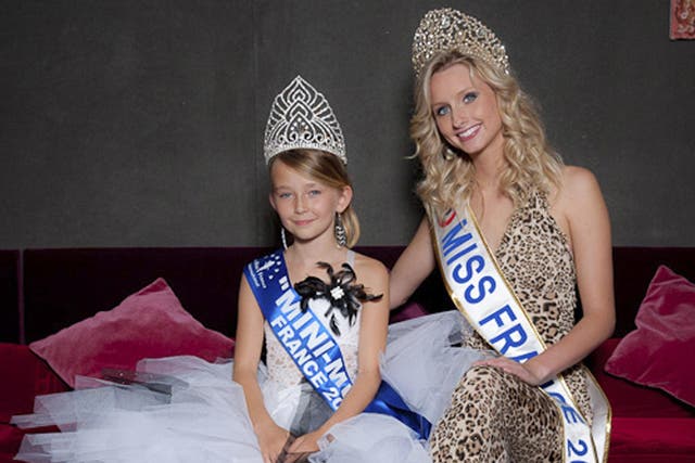 Oceane Scharre, 10, elected Mini Miss France 2011 (left) and Miss France 2011 Mathilde Florin. France's Senate has voted to ban beauty pageants for children under 16, in an effort to protect children, especially girls from being sexualized too early.