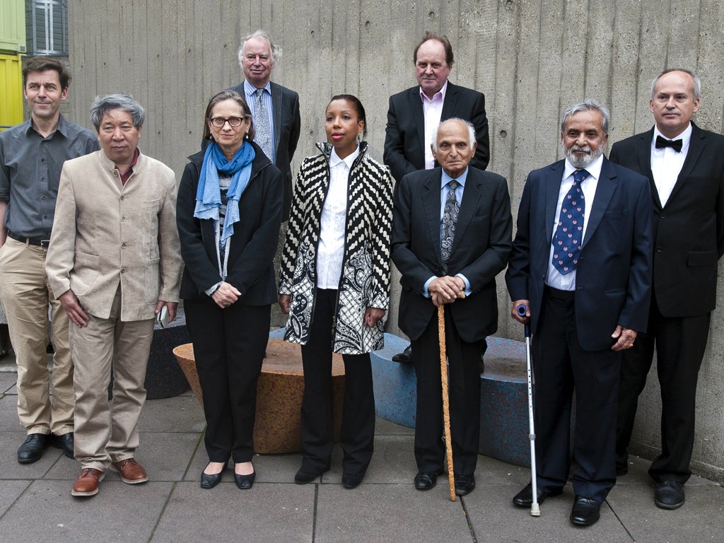 Authors (front L-R) Swiss Peter Stamm, Chinese Yan Lianke, US, Lydia Davis, French Marie N'Diaye, Indian Intizar Husain, Indian U R Anathamurthy and Croatian-Canadian Josip Novakovich, (back row L-R) Jonathan Taylor, Chair of the Booker Prize Foundation,