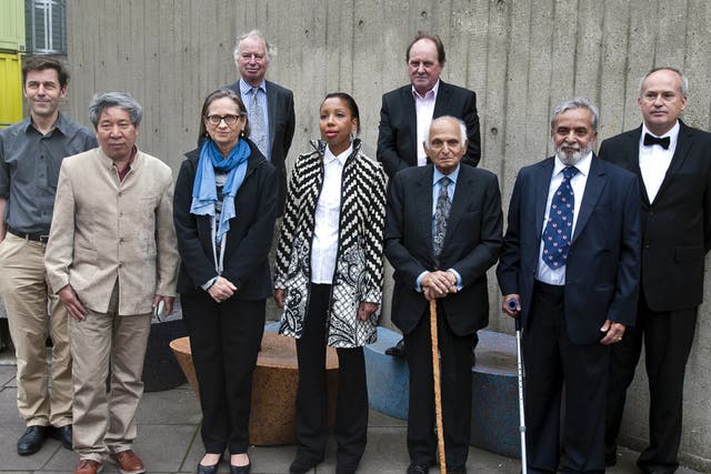 Authors (front L-R) Swiss Peter Stamm, Chinese Yan Lianke, US, Lydia Davis, French Marie N'Diaye, Indian Intizar Husain, Indian U R Anathamurthy and Croatian-Canadian Josip Novakovich, (back row L-R) Jonathan Taylor, Chair of the Booker Prize Foundation, 