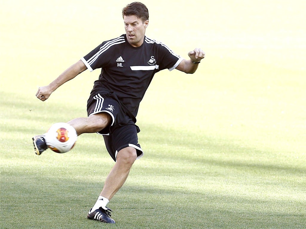 Swansea manager Michael Laudrup shows he hasn’t lost the old touch during training