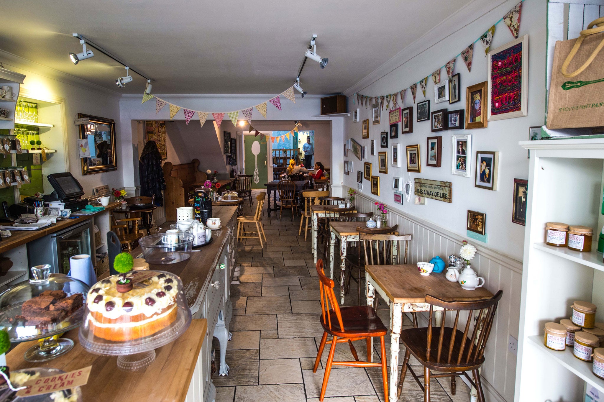 Jaunty: The South Street Pantry features mismatched furniture and a counter laden with cakes