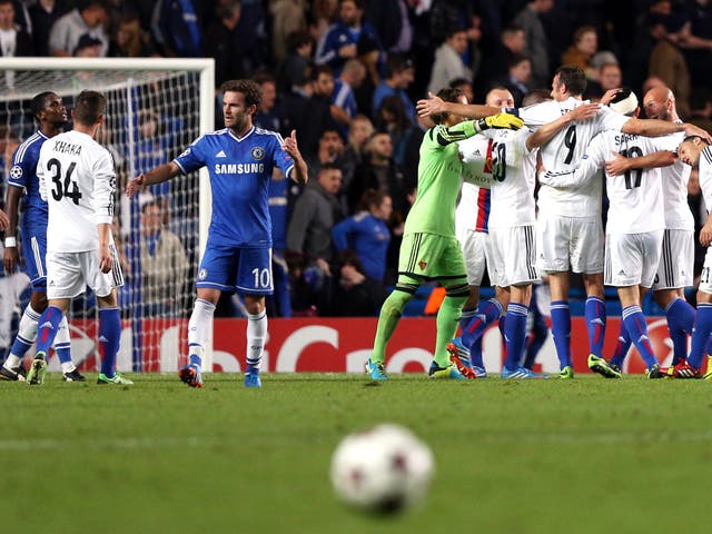 Basel players celebrate at the final whistle after beating Chelsea 2-1