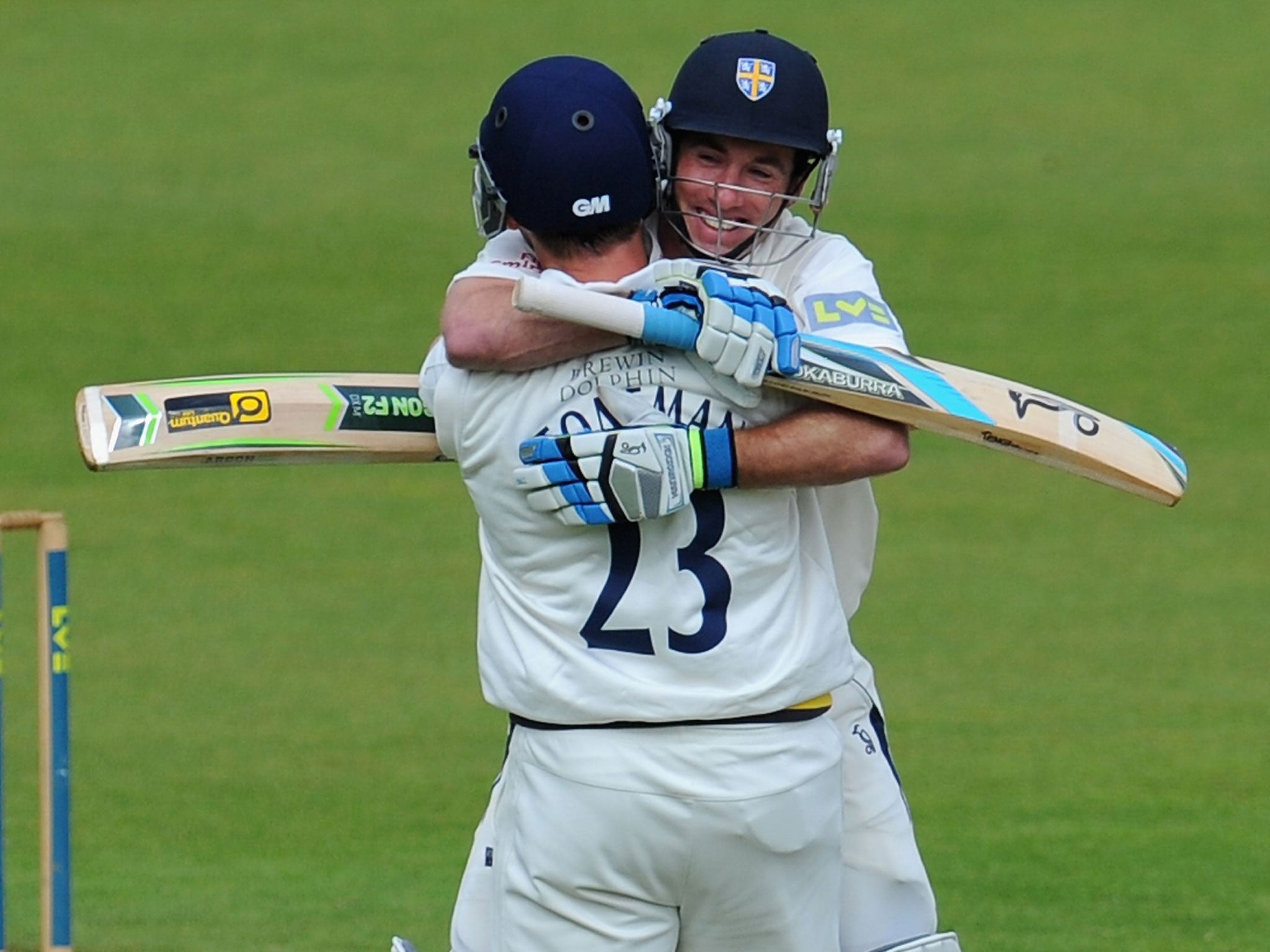 Durham batsmen Will Smith (right) and Mark Stoneman celebrate after winning the County Championship