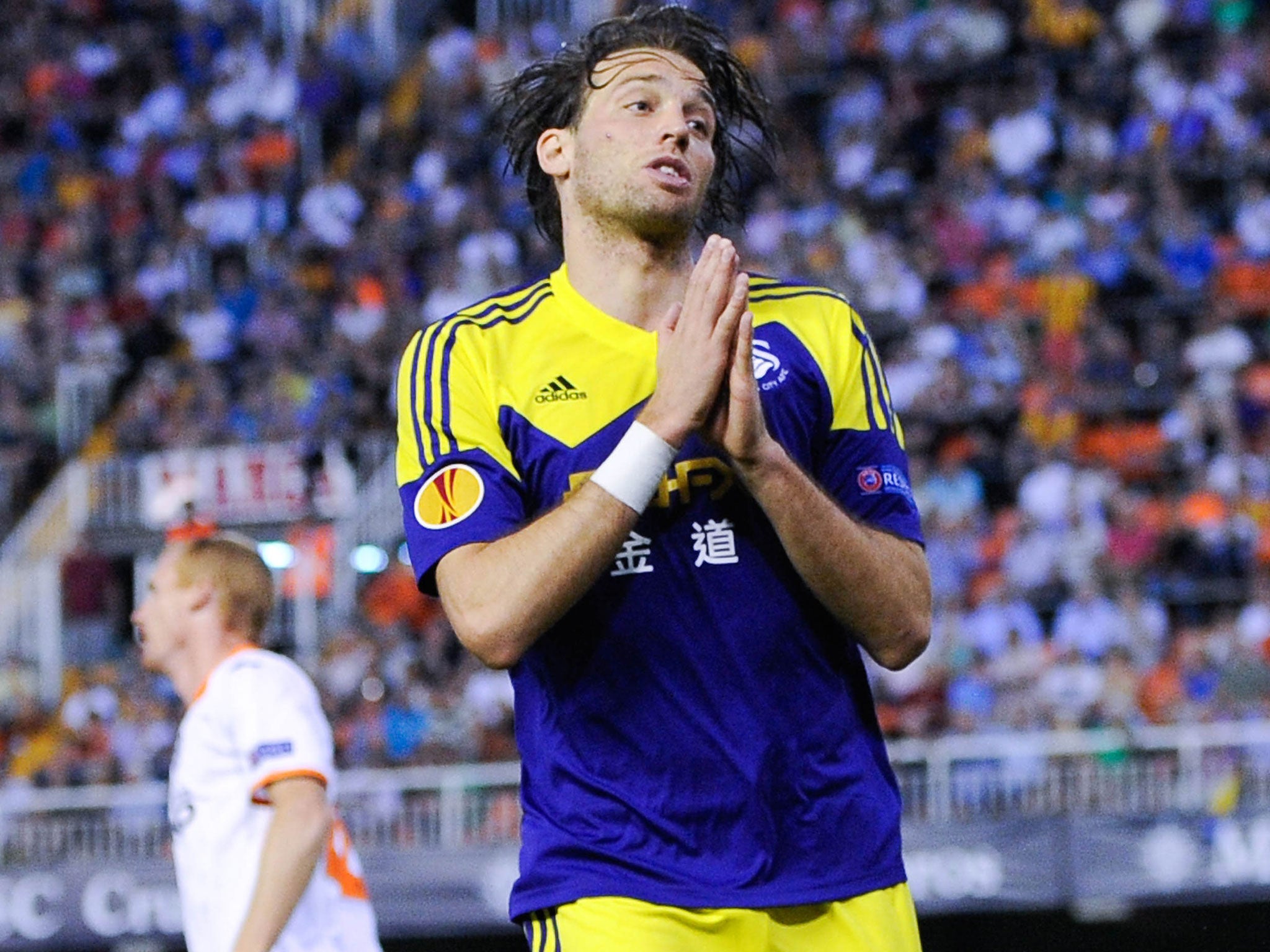 Michu celebrates after scoring Swansea’s second at the Mestalla