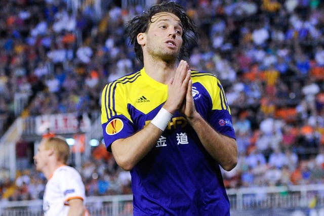 Michu celebrates after scoring Swansea’s second at the Mestalla