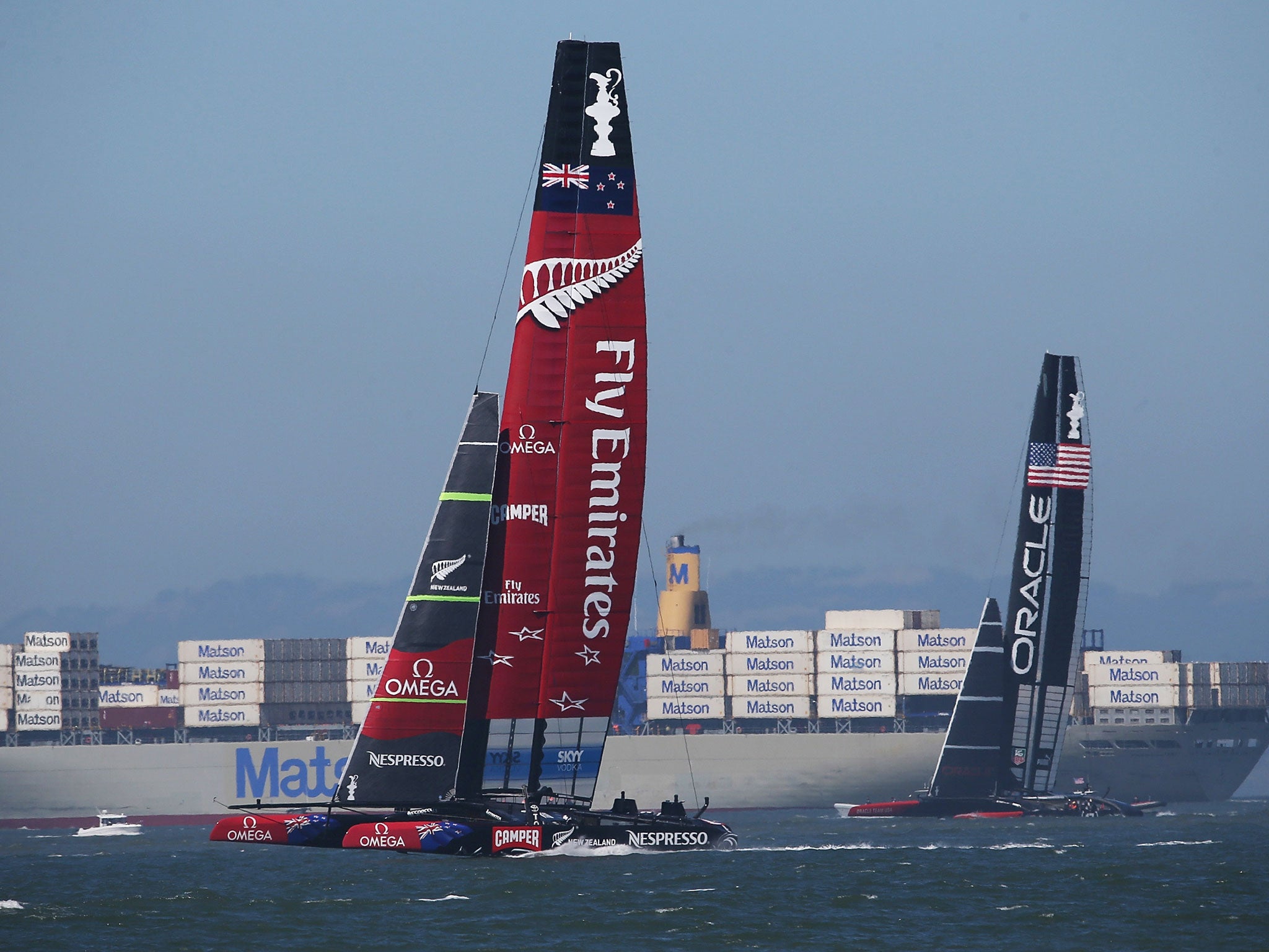 Oracle Team USA skippered James Spithill (R) in action against Emirates Team New Zealand skippered Dean Barker (L) during race twelve of the America's Cup finals