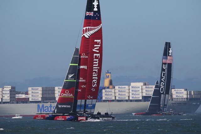 Oracle Team USA skippered James Spithill (R) in action against Emirates Team New Zealand skippered Dean Barker (L) during race twelve of the America's Cup finals
