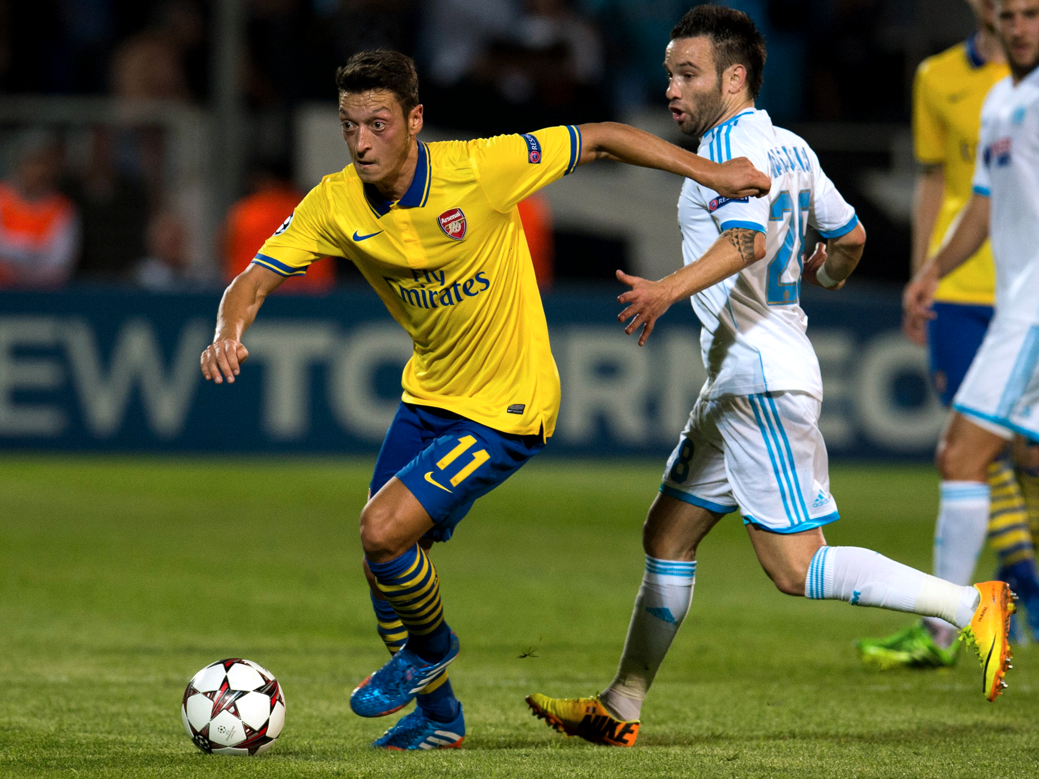 Mesut Ozil in action for Arsenal against Marseille