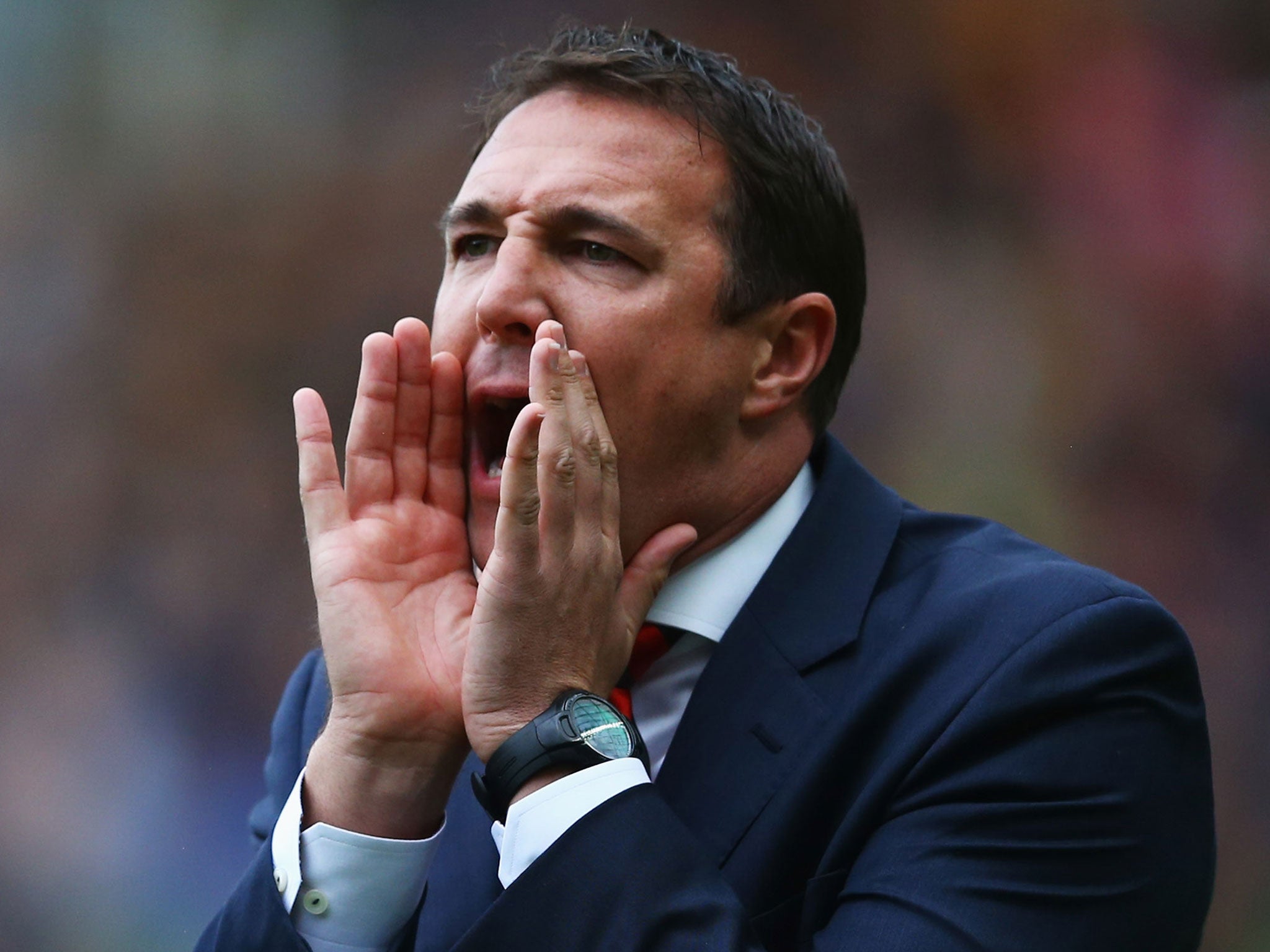 Cardiff manager Malky Mackay shouts on from the touchline