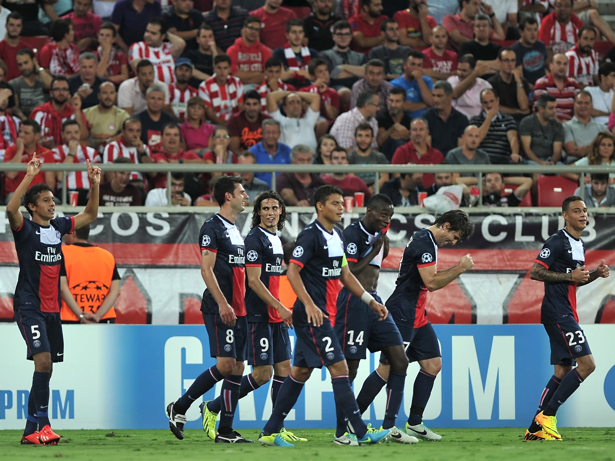 Paris-Saint Germain celebrate after scoring against Olympiakos