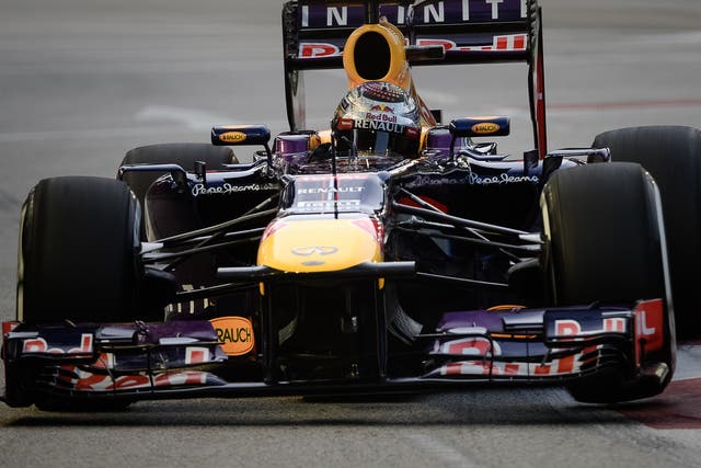 Sebastian Vettel  on his way to pole position for the Singapore Grand Prix