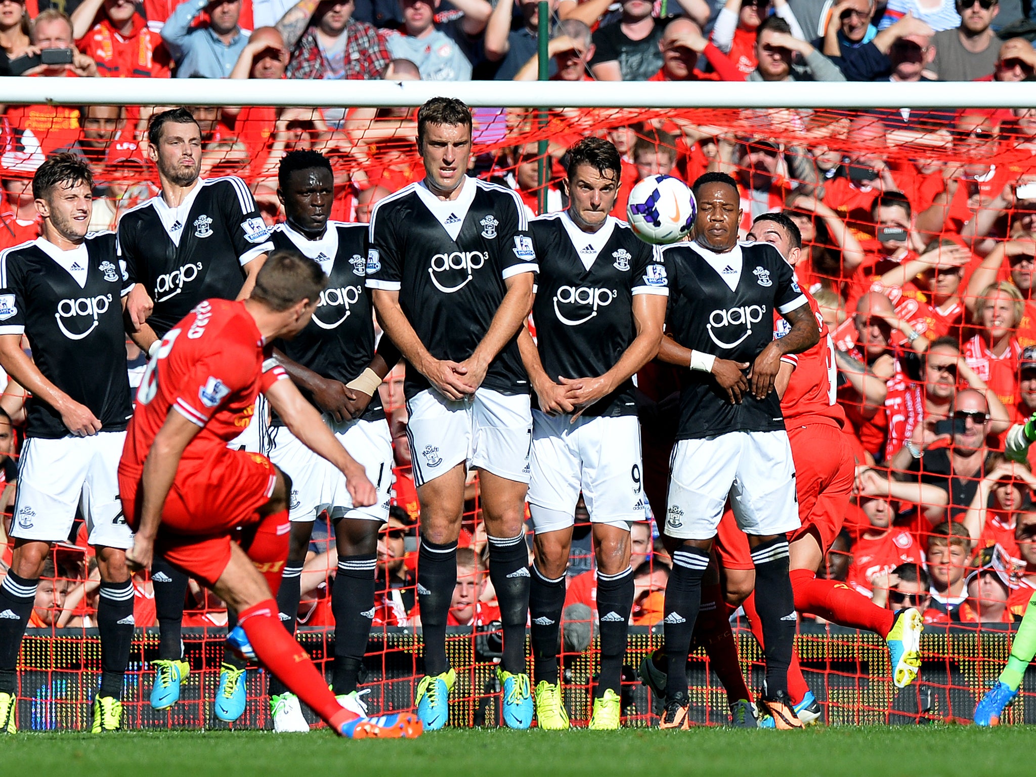 Liverpool's Steven Gerrard takes a free kick against Southampton