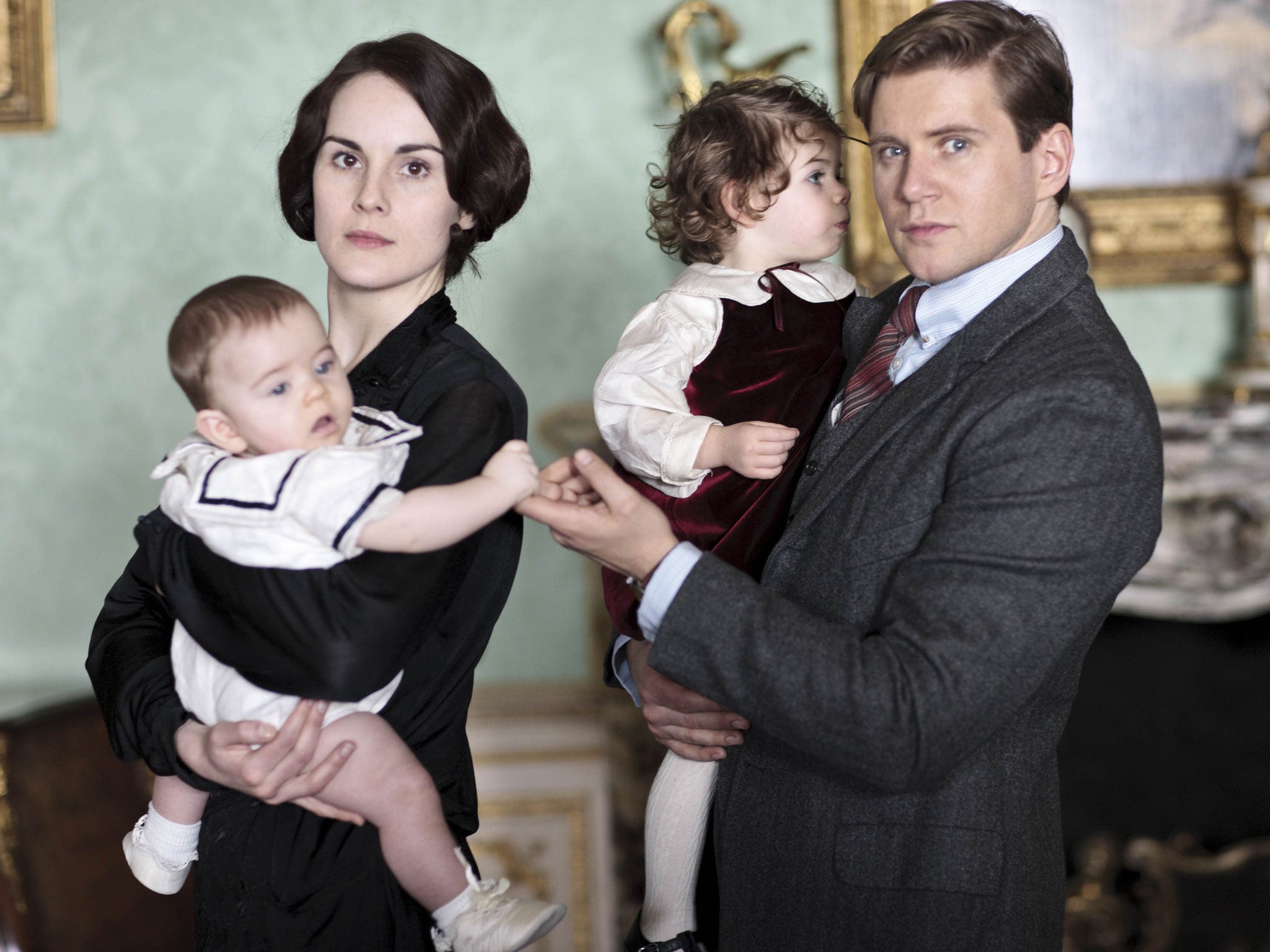 Posh parents: Downton Abbey’s Lady Mary with baby George, and Tom Branson with Sybbie