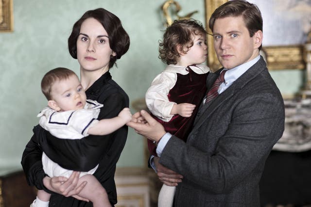 Posh parents: Downton Abbey’s Lady Mary with baby George, and Tom Branson with Sybbie