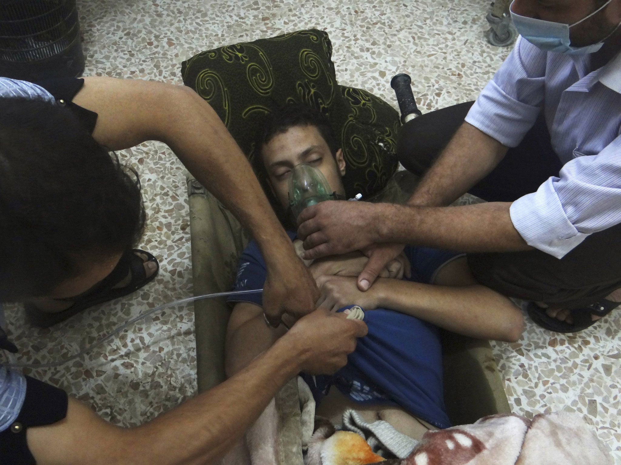A man is treated after the gas attack of 21 August