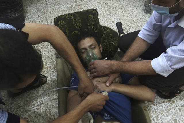 A man is treated after the gas attack of 21 August