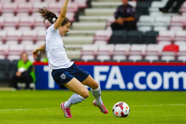 Hot shot: In-form Karen Carney scores the first goal for England yesterday