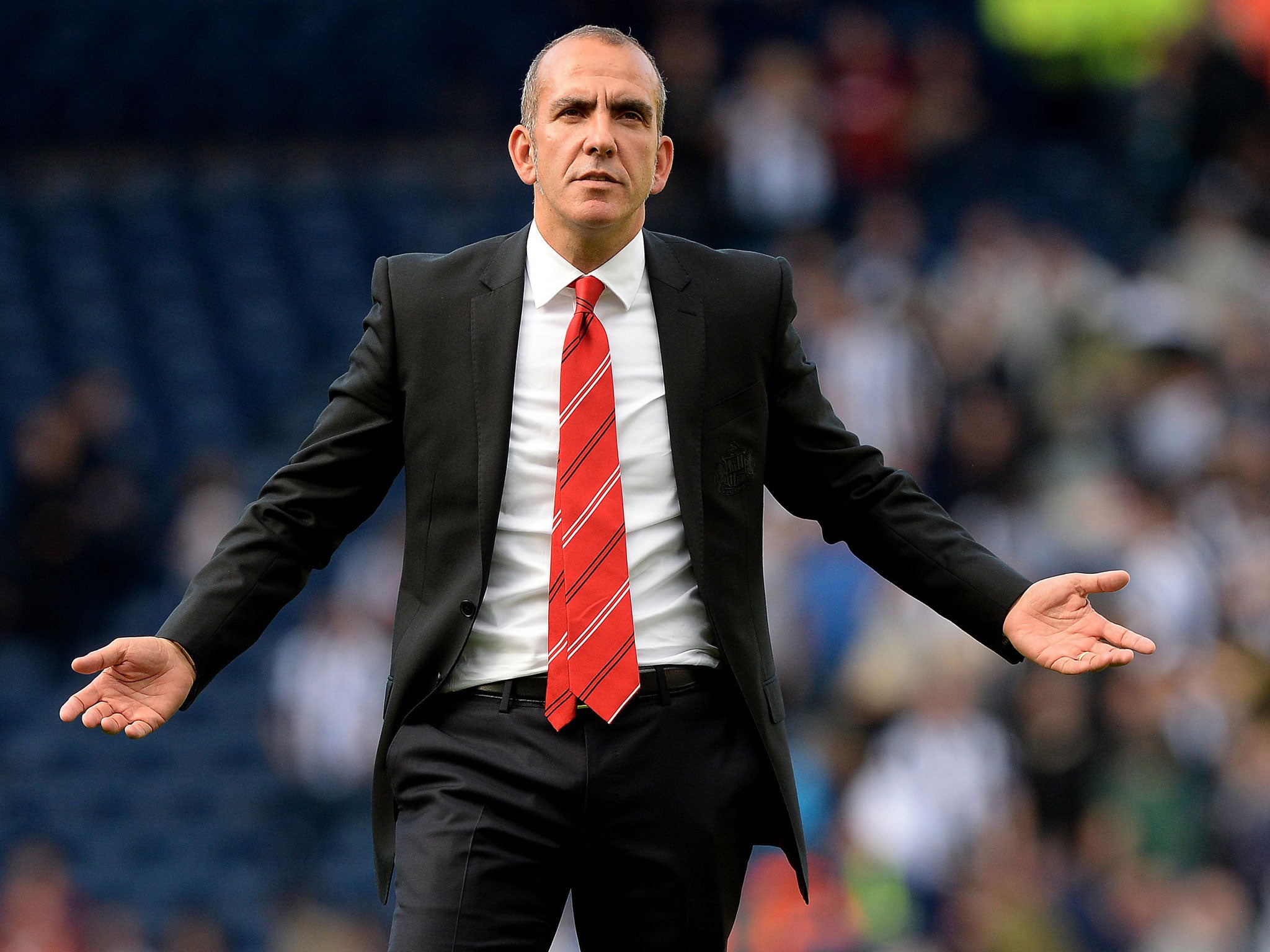 Sunderland manager Paolo Di Canio gestures to the Sunderland fans