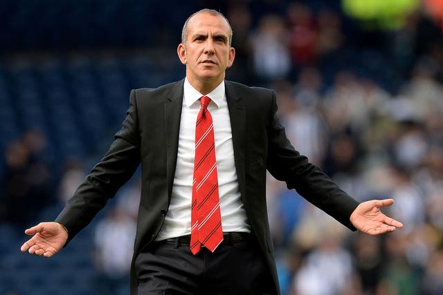 Sunderland manager Paolo Di Canio gestures to the Sunderland fans 
