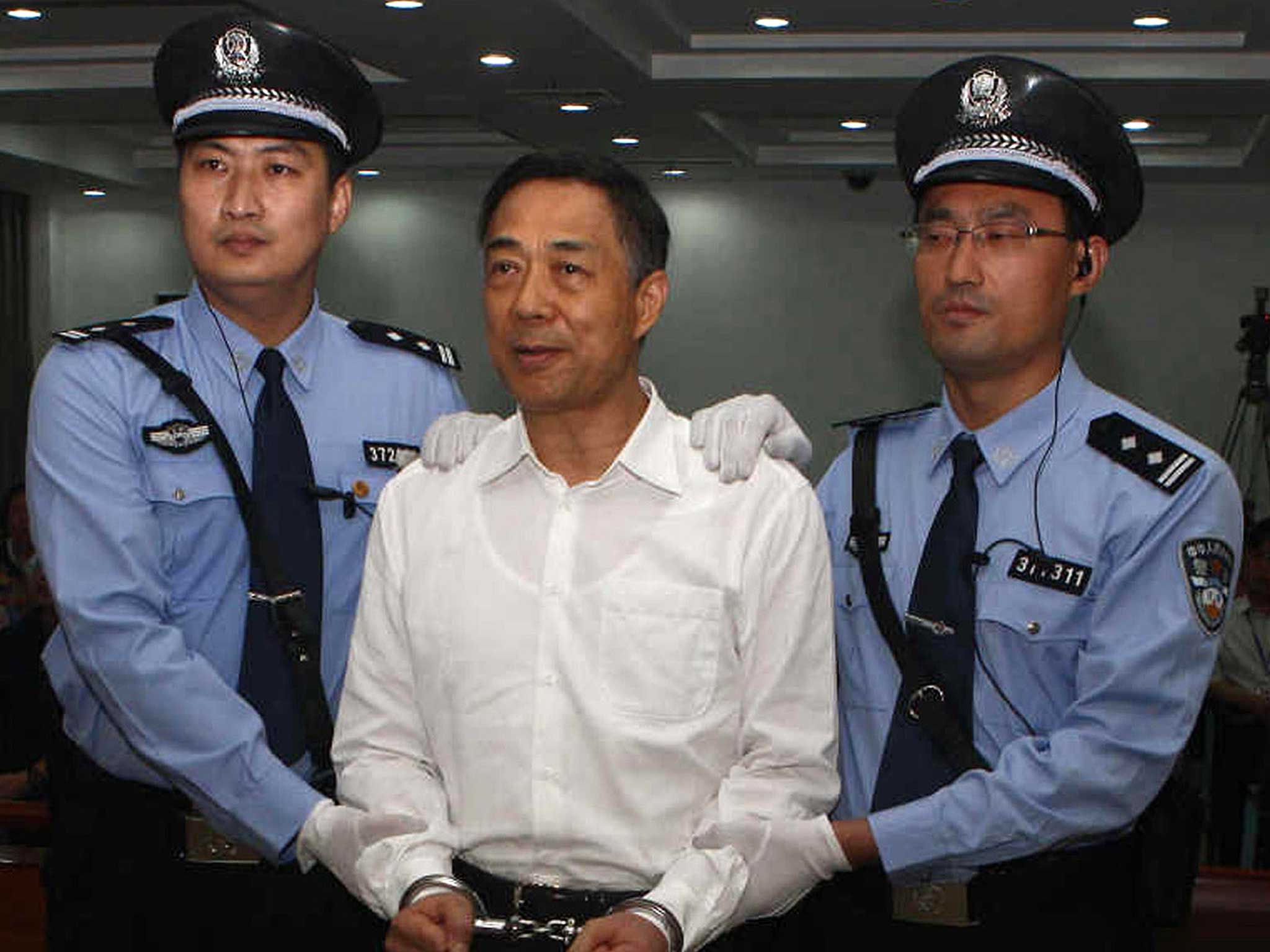 Chinese political star Bo Xilai (centre) has lost his final appeal