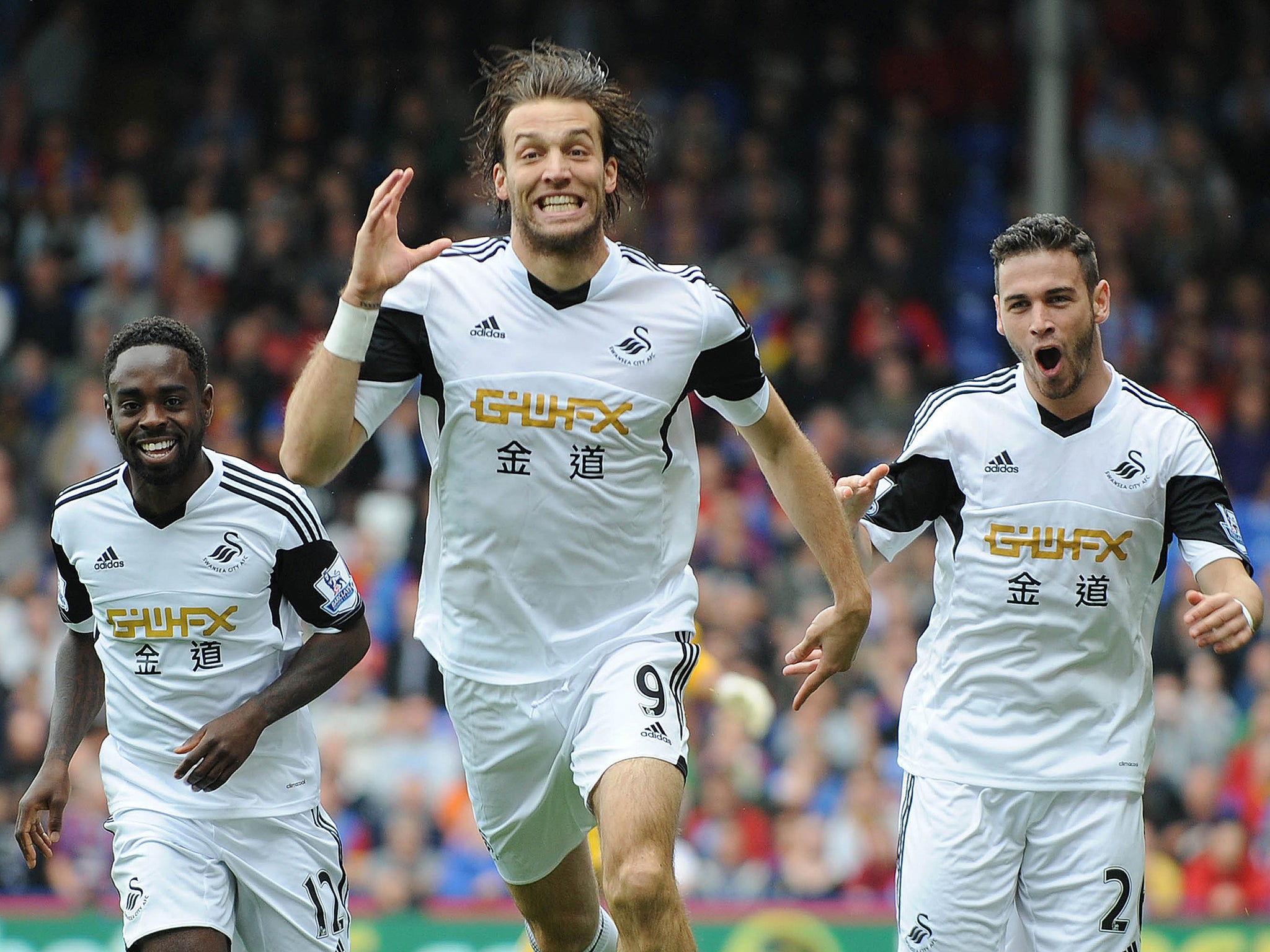 Michu celebrates after scoring for Swansea against Crystal Palace