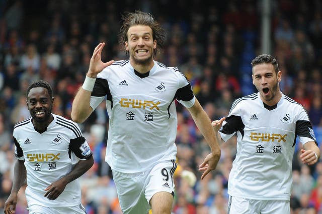 Michu celebrates after scoring for Swansea against Crystal Palace