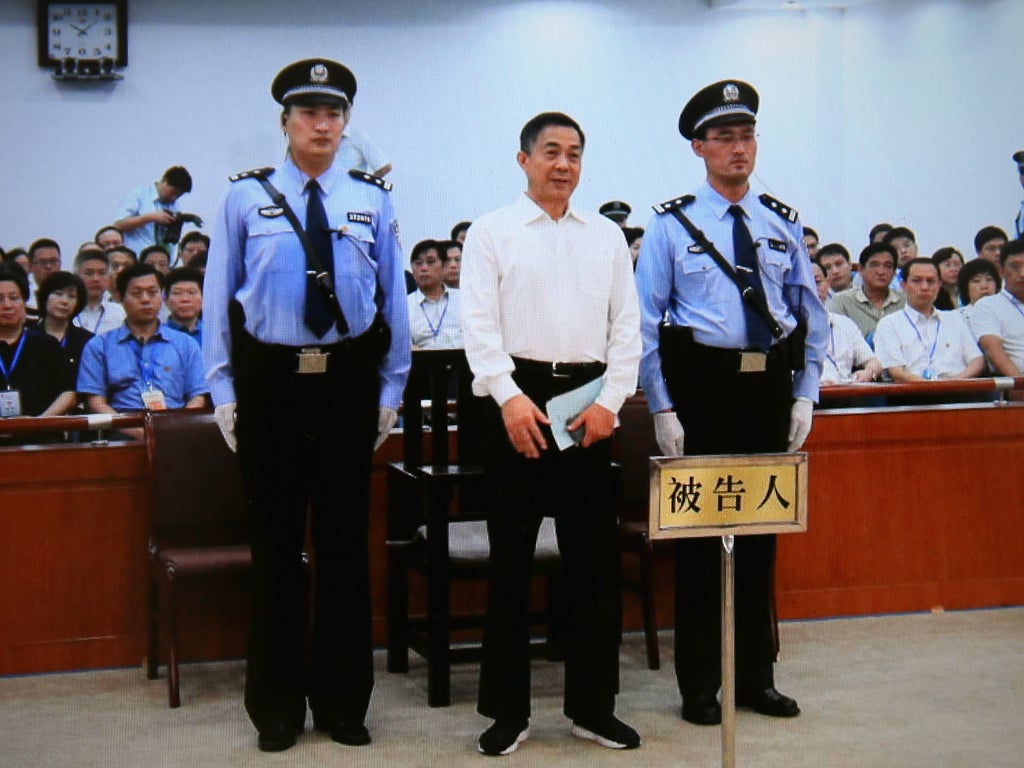 A screen shows the picture of the sentence of Chinese politician Bo Xilai (Center) on September 22, 2013 in Beijing, China. The Jinan Intermediate People's Court announced Bo Xilai, former member of the CPC Central Committee Political Bureau, was sentence