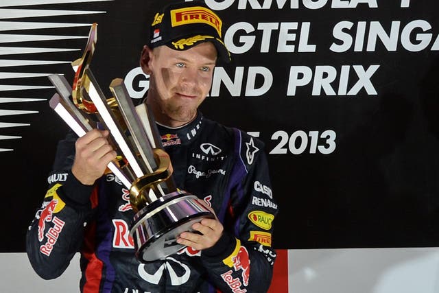 Sebastian Vettel celebrates his victory at the Singapore Grand Prix