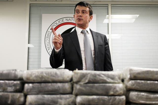 Interior minister Manuel Valls with some of the drugs haul