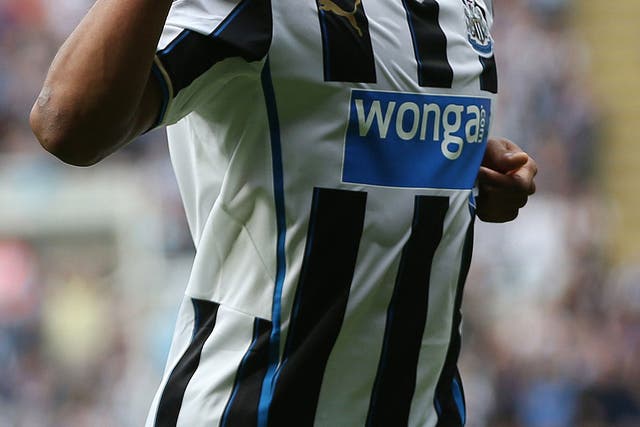 Loïc Rémy celebrates one of his two goals for Newcastle