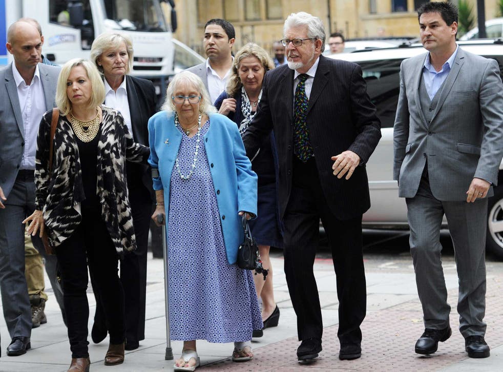 Rolf Harris (second right) and his wife Alwen (centre) arrive at the City of Westminster Magistrates Courts