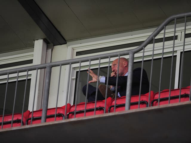 Ian Holloway watches from the stands